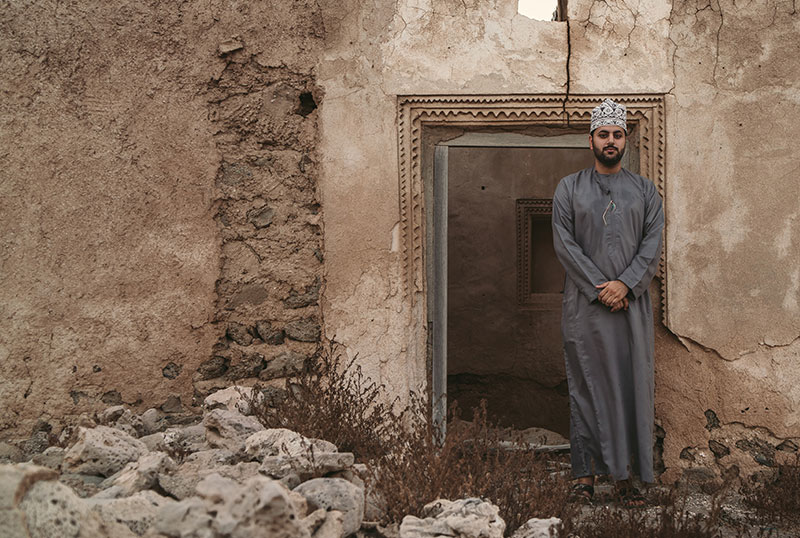 A student studying Arabic texts